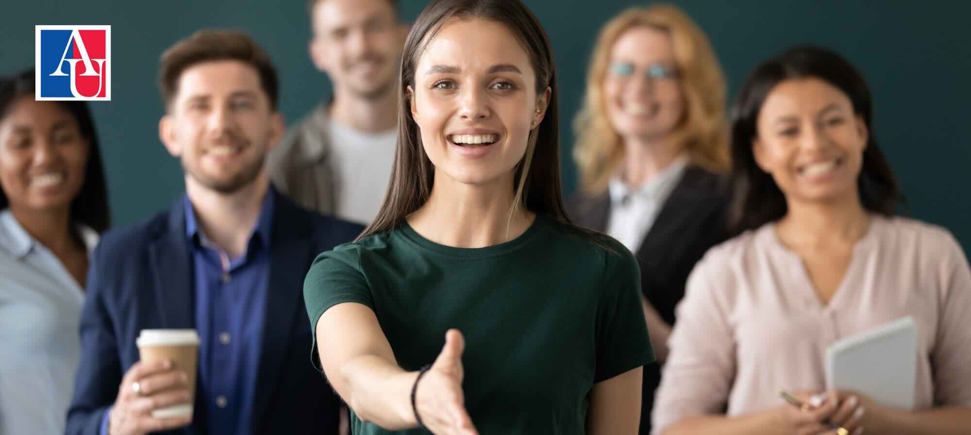 Young professionals offer greeting
