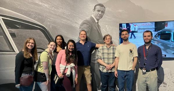 Student tour group at the International Spy Museum's Cold War artifacts.