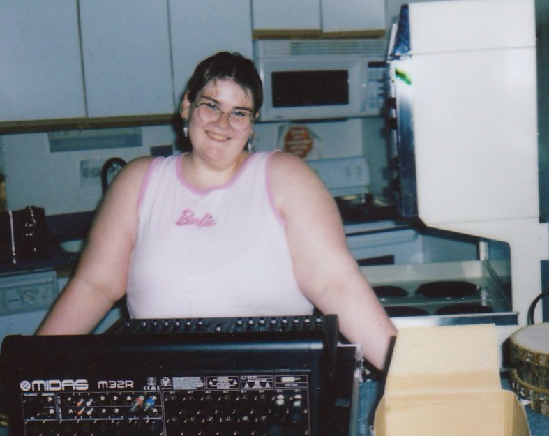 Samantha Farace with audio production equipment in a kitchen
