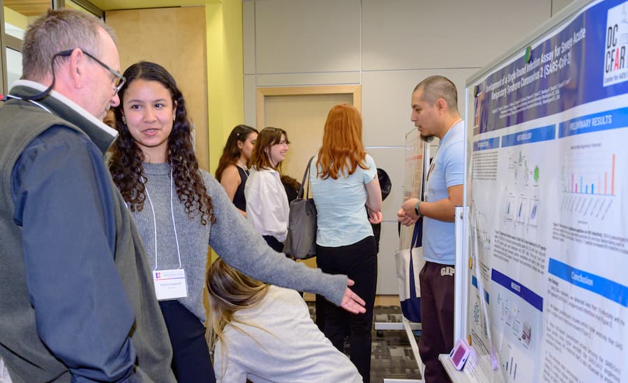 Posters, presenters, and attendees.
