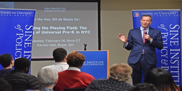 Sine Fellow Bill de Blasio speaking at event.