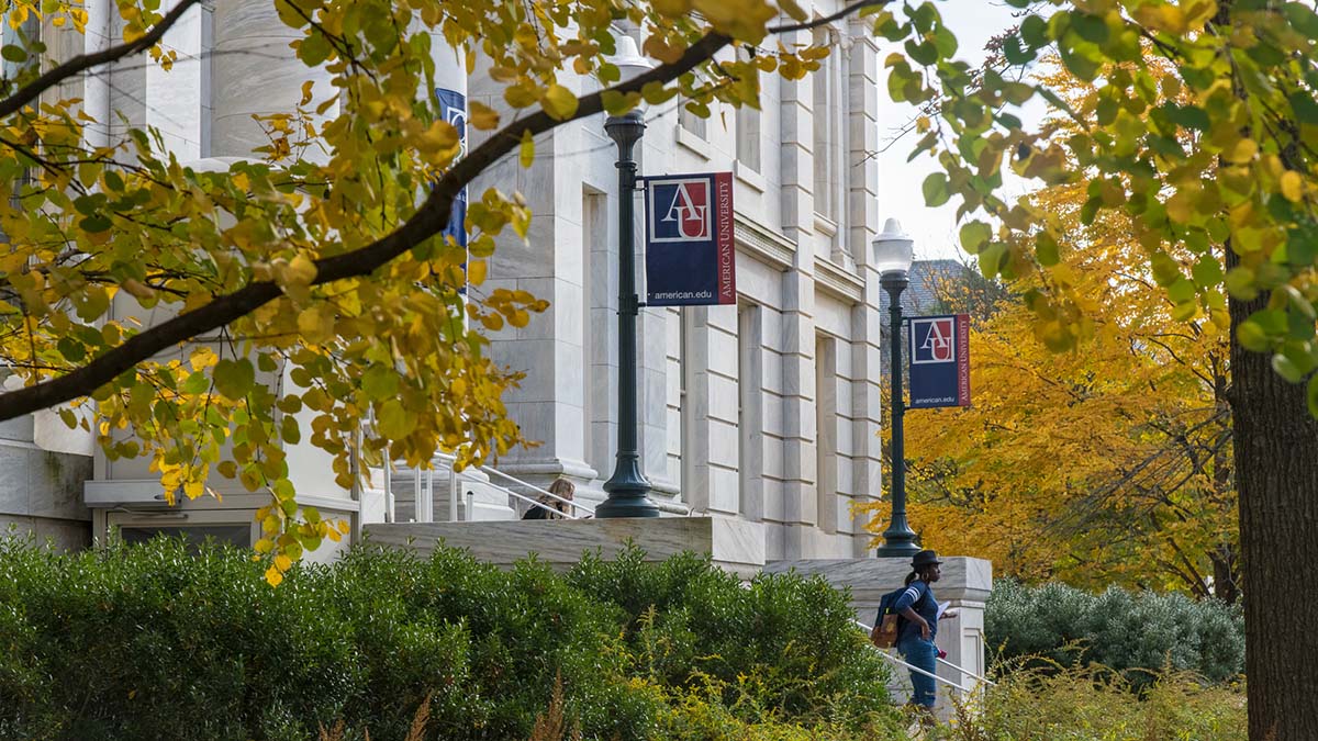 A student walking out of Kerwin Hall