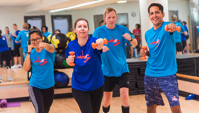Two women and two men participating in an AhealthyU class