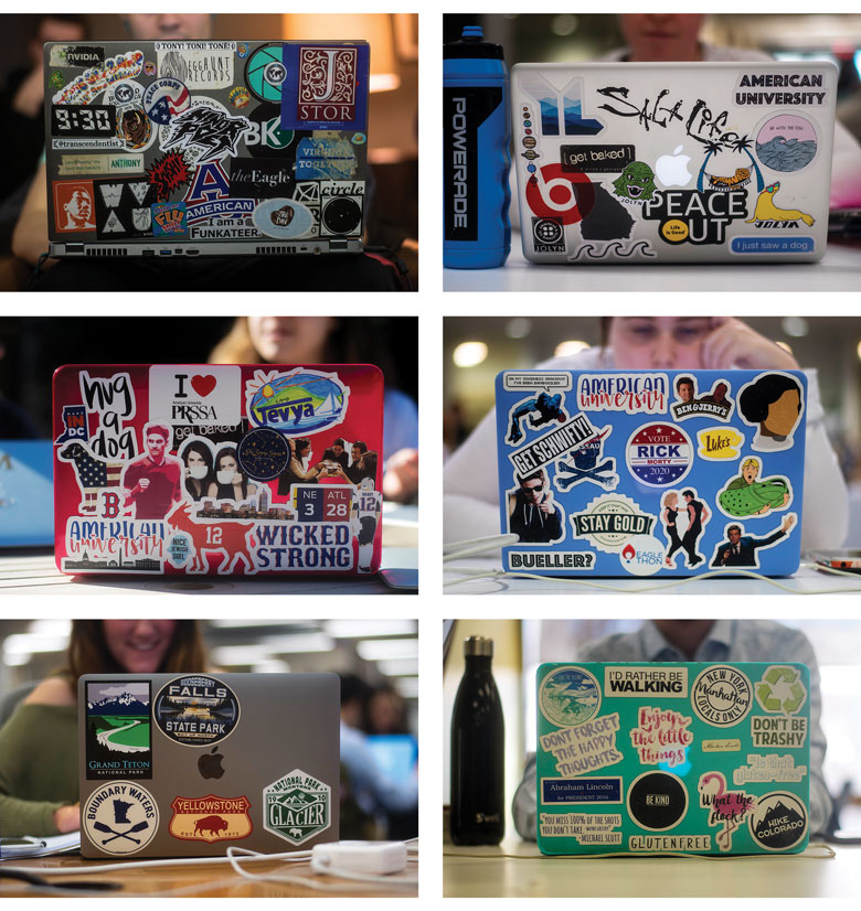 six laptops decorated with an array of colorful stickers