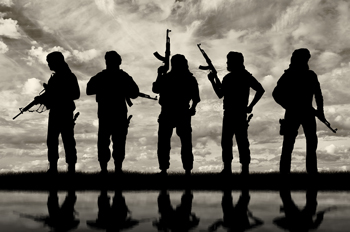 Five terrorists silhouetted against a cloudy sky