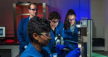 Students working on carbon electrodes in Prof. Zestos lab.