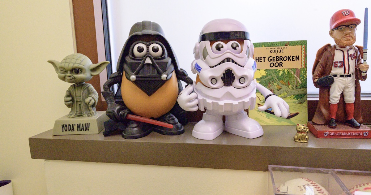 Patrick Thaddeus Jackson's Star Wars related knick knacks in his office. Photo by Jeff Watts.