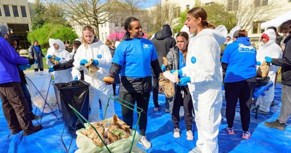 The AU women's soccer team helps with the MGSC waste audit. Photo by Jeff Watts.