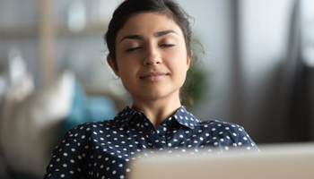 Young woman with closed eyes and content expression