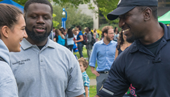 American University safety officials talking to student