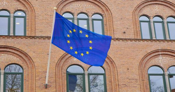 EU flag against brick building