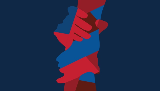 Two hands holding each other.