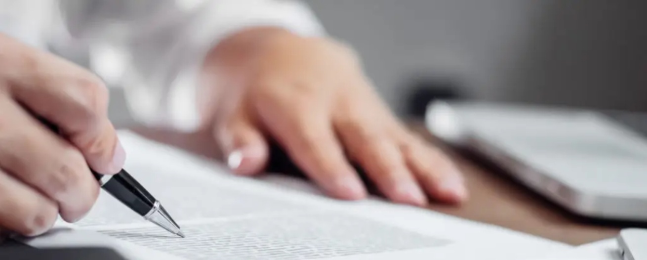 person reviewing policy document