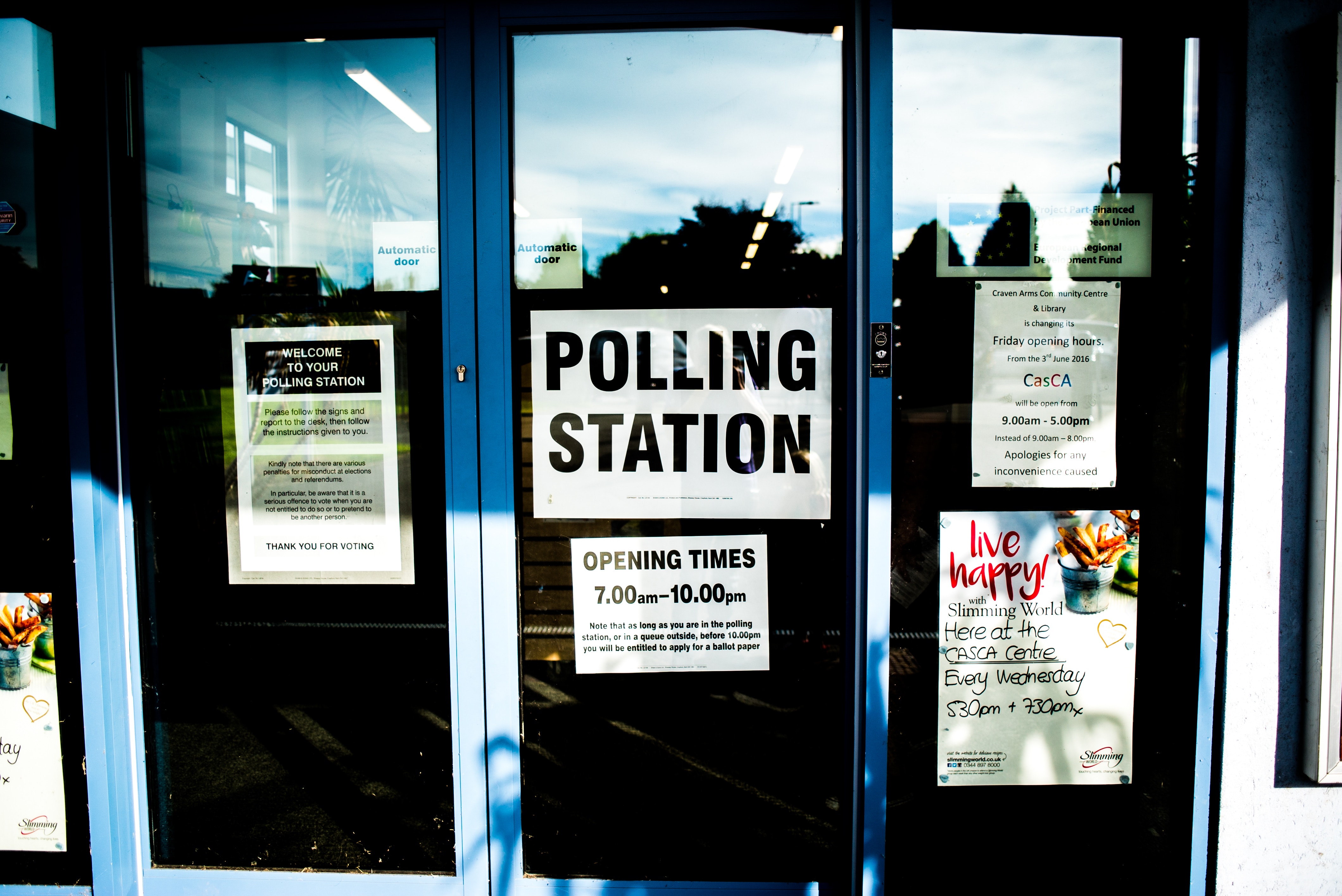 Photo of a polling station with a sign that says polling station
