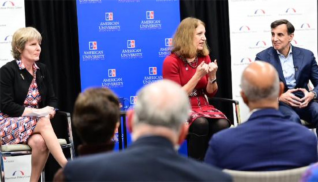 President Sylvia Burwell discusses free speech as Johns Hopkins president Ron Daniels sitts next to her, with moderator Jacqueline Pfeffer Merrill of the Bipartisan Policy Center on her other side.