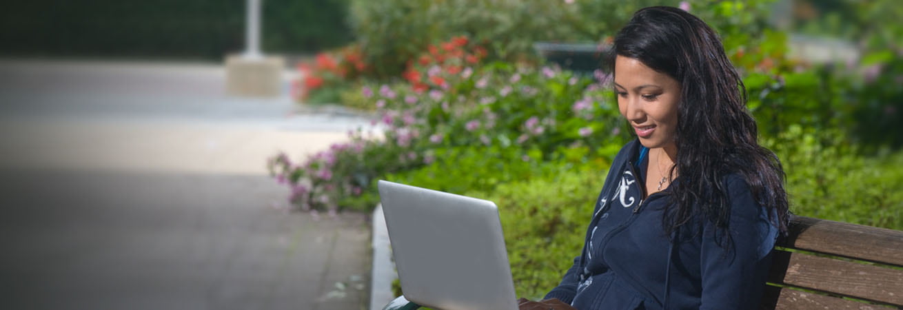 Student works on laptop